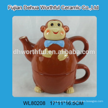 Bule de cerâmica em forma de macaco com copo